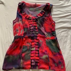 Sheer colorful floral blouse.